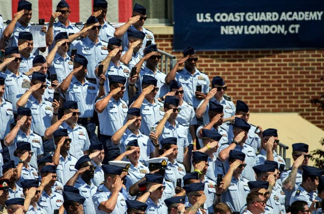 United States Coast Guard Academy Cadets salute during their graduation ceremony in New London, Connecticut on Wednesday, May 20, 2026. President Donald Trump will deliver the commencement speech.  CONN20260520444 ANGELINAxKATSANIS