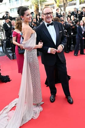American actor Kevin Spacey and Uzbbek model Via Lemann attend the premiere of La Bataille De Gaulle at the 79th Cannes Film Festival in Cannes, France on Wednesday, May 20, 2026.  CAN20260520148 RUNExHELLESTAD