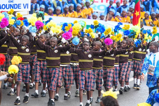 (260520) -- YAOUNDE, May 20, 2026 -- Primary school students march during the National Day celebrations in Yaounde, Cameroon, on May 20, 2026. Cameroon on Wednesday marked the 54th anniversary of its National Day with military and civilian parades held across the country. ) CAMEROON-54TH NATIONAL DAY-CELEBRATIONS Kepseu 