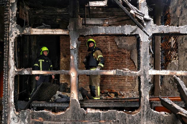 RECORD DATE NOT STATED Firefighters deal with the aftermath of a Russian drone attack in Odesa, Ukraine, on May 18, 2026. As a result of a massive overnight attack by Russian strike drones, several residential buildings in the Prymorskyi and Kyivskyi districts sustained significant damage. Roofs of three-storey buildings were destroyed, while a one-storey house was ruined in another area. Buildings of a city lyceum and a kindergarten were also damaged. Two people, an 11-year-old boy and a 59-year-old man, were injured (Photo by Nina Liashonok Ukrinform) Aftermath of overnight Shahed drone attack on Odesa  Copyright: xNinaxLiashonokx