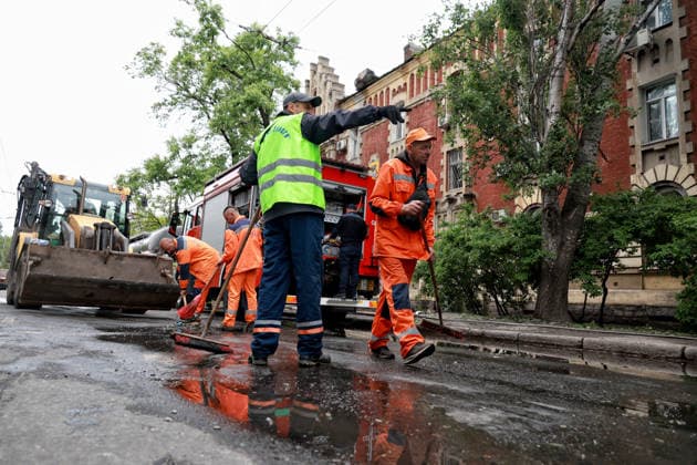 RECORD DATE NOT STATED Municipal services workers deal with the aftermath of a Russian drone attack in Odesa, Ukraine, on May 18, 2026. As a result of a massive overnight attack by Russian strike drones, several residential buildings in the Prymorskyi and Kyivskyi districts sustained significant damage. Roofs of three-storey buildings were destroyed, while a one-storey house was ruined in another area. Buildings of a city lyceum and a kindergarten were also damaged. Two people, an 11-year-old boy and a 59-year-old man, were injured (Photo by Nina Liashonok Ukrinform) Russian drone attack on Odesa leaves people injured  Copyright: xNinaxLiashonokx