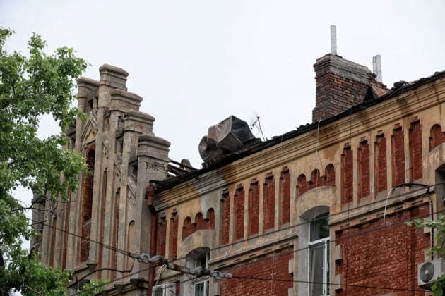 RECORD DATE NOT STATED A building damaged in a Russian drone attack is seen in Odesa, Ukraine, on May 18, 2026. As a result of a massive overnight attack by Russian strike drones, several residential buildings in the Prymorskyi and Kyivskyi districts sustained significant damage. Roofs of three-storey buildings were destroyed, while a one-storey house was ruined in another area. Buildings of a city lyceum and a kindergarten were also damaged. Two people, an 11-year-old boy and a 59-year-old man, were injured (Photo by Nina Liashonok Ukrinform) Russian drone attack on Odesa leaves people injured  Copyright: xNinaxLiashonokx