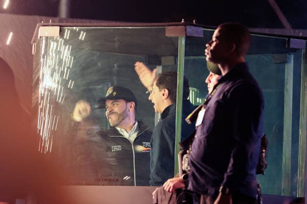 May 20, 2026, Bogota, Cundinamarca, COLOMBIA: Right-wing presidential candidate ABELARDO DE LA ESPRIELLA and his vice-presidential running mate, JOSo° MANUEL RESTREPO address a crowd from behind bulletproof glass during his campaign closing rally ahead of the first-round presidential vote May 31st. The high-security setup serves as a stark visual reminder of Colombia s electoral history, where the threat of political violence has historically cast a shadow over democratic campaigns. Bogota COLOMBIA  - ZUMAd225 20260520_znp_d225_002 Copyright: xZoraidaxDiazx