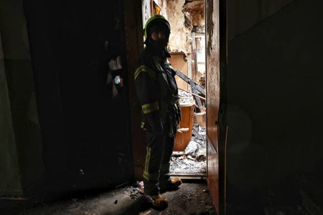 RECORD DATE NOT STATED A firefighter works to eliminate the aftermath of a Russian drone attack in Odesa, Ukraine, on May 18, 2026. As a result of a massive overnight attack by Russian strike drones, several residential buildings in the Prymorskyi and Kyivskyi districts sustained significant damage. Roofs of three-storey buildings were destroyed, while a one-storey house was ruined in another area. Buildings of a city lyceum and a kindergarten were also damaged. Two people, an 11-year-old boy and a 59-year-old man, were injured (Photo by Nina Liashonok Ukrinform) Russian drone attack on Odesa leaves people injured  Copyright: xNinaxLiashonokx