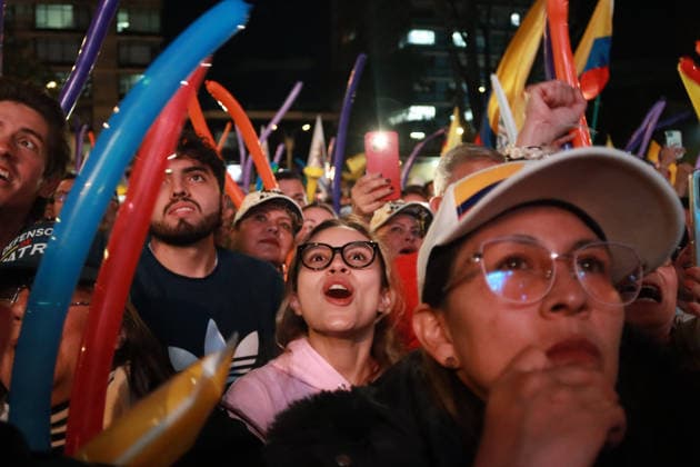 May 20, 2026, Bogota, Cundinamarca, COLOMBIA: Followers of right-wing presidential candidate ABELARDO DE LA ESPRIELLA cheer him on as he addresses the crowd during his campaign closing rally ahead of the first-round presidential vote May 31st. The high-security setup serves as a stark visual reminder of Colombia s electoral history, where the threat of political violence has historically cast a shadow over democratic campaigns. Bogota COLOMBIA - ZUMAd225 20260520_znp_d225_007 Copyright: xZoraidaxDiazx