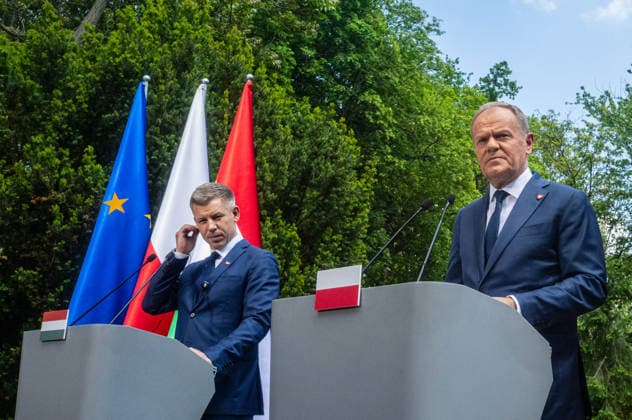 May 20, 2026, Warsaw, Poland: New Hungarian Prime Minister, Peter Magyar and Polish Prime Minister, Donald Tusk held a joint press conference during their meeting at the Polish Prime Minister s residence. On the morning of Wednesday, the 20th of May, on his first foreign visit, the new Prime Minister of Hungary, Peter Magyar, meets with Polish Prime Minister Donald Tusk. The visit symbolically marks the opening of a new phase in Budapest s relations with Europe. During the meeting the Prime Ministers discuss Magyar s victory in the recent Hungarian elections, the Polish-Hungarian relationship, and the issue of Zbigniew Ziobra and Marcin Romanowski - two Polish politicians evading prosecution in Poland by hiding in Hungary. After the meeting - ZUMAs197 20260520_aaa_s197_274 Copyright: xNeilxMiltonx