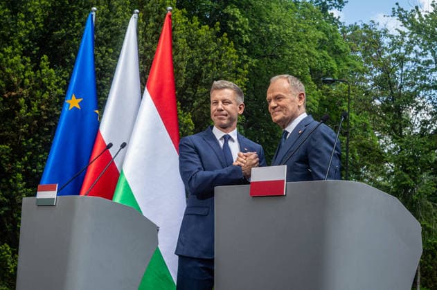 May 20, 2026, Warsaw, Poland: New Hungarian Prime Minister, Peter Magyar and Polish Prime Minister, Donald Tusk held a joint press conference during their meeting at the Polish Prime Minister s residence. On the morning of Wednesday, the 20th of May, on his first foreign visit, the new Prime Minister of Hungary, Peter Magyar, meets with Polish Prime Minister Donald Tusk. The visit symbolically marks the opening of a new phase in Budapest s relations with Europe. During the meeting the Prime Ministers discuss Magyar s victory in the recent Hungarian elections, the Polish-Hungarian relationship, and the issue of Zbigniew Ziobra and Marcin Romanowski - two Polish politicians evading prosecution in Poland by hiding in Hungary. After the meeting  - ZUMAs197 20260520_aaa_s197_278 Copyright: xNeilxMiltonx