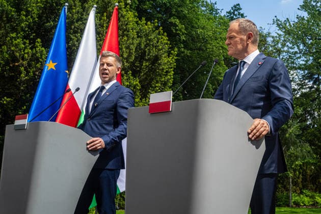 May 20, 2026, Warsaw, Poland: New Hungarian Prime Minister, Peter Magyar and Polish Prime Minister, Donald Tusk held a joint press conference during their meeting at the Polish Prime Minister s residence. On the morning of Wednesday, the 20th of May, on his first foreign visit, the new Prime Minister of Hungary, Peter Magyar, meets with Polish Prime Minister Donald Tusk. The visit symbolically marks the opening of a new phase in Budapest s relations with Europe. During the meeting the Prime Ministers discuss Magyar s victory in the recent Hungarian elections, the Polish-Hungarian relationship, and the issue of Zbigniew Ziobra and Marcin Romanowski - two Polish politicians evading prosecution in Poland by hiding in Hungary. After the meeting - ZUMAs197 20260520_aaa_s197_281 Copyright: xNeilxMiltonx