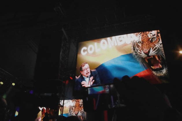May 20, 2026, Bogota, Cundinamarca, COLOMBIA: A giant screen at the campaign closing rally for right-wing presidential candidate ABELARDO DE LA ESPRIELLA, shows the President of Colombia GUSTAVO PETRO cowering before a tiger. El Tigre (The Tiger) is the central symbol, campaign nickname, and political persona of DE LA ESPRIELLA. His independent movement, Firmes por la Patria (Firm for the Homeland), centers its entire identity on this predatory mascot to project a distinct political brand representing a hardline stance on crime, stating that the tiger bites hard when dealing with corrupt politicians, urban criminals, and left-wing guerrillas. Bogota COLOMBIA  - ZUMAd225 20260520_znp_d225_009 Copyright: xZoraidaxDiazx