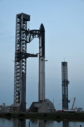 The SpaceX Super Heavy Booster and Starship spacecraft stand on Orbital Launch Pad 2 at Starbase, Texas during the early evening on Wednesday May 20, 2026. SpaceX remains on schedule so far for a launch attempt on Thursday, May 21. SpaceX is monitoring all the upgrades made on the new pad, the booster and Starship. The launch window will open at 5:30 PM.  SBP20260520005 JOExMARINO