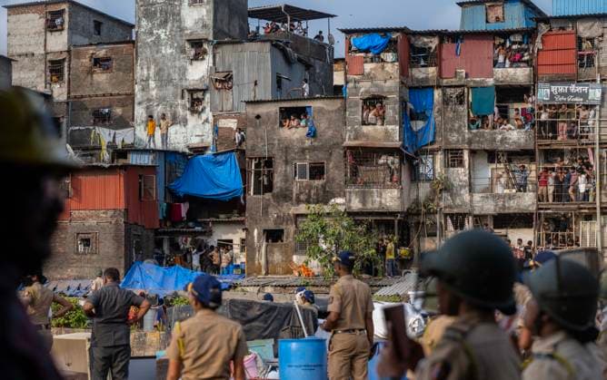 MUMBAI, INDIA - MAY 20: Residents of the ‘Garib Nagar’ slum in Bandra East allegedly pelt stones at police during the second day of an anti-encroachment drive on railway land, prompting a mild lathi-charge by police to control the situation on May 20, 2026 in Mumbai, India. (Photo by Satish Bate Hindustan Times) Second Day Of Demolition Drive At Bandra Garib Nagar