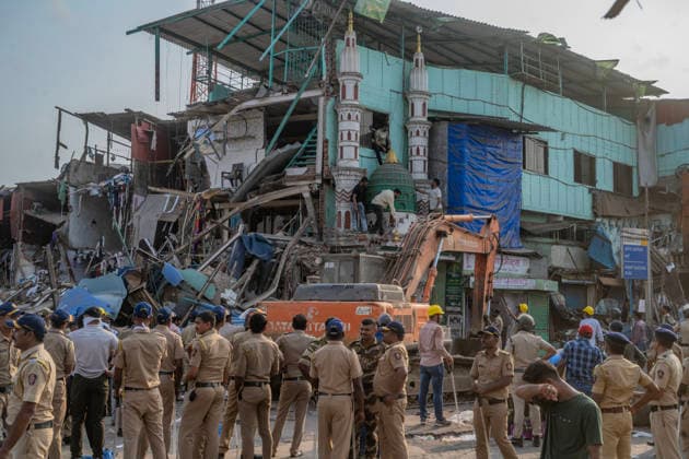 MUMBAI, INDIA - MAY 20: Heavy police deployment on the second day of an anti-encroachment drive at Garib Nagar slum on railway land on May 20, 2026 in Mumbai, India. (Photo by Satish Bate Hindustan Times) Second Day Of Demolition Drive At Bandra Garib Nagar