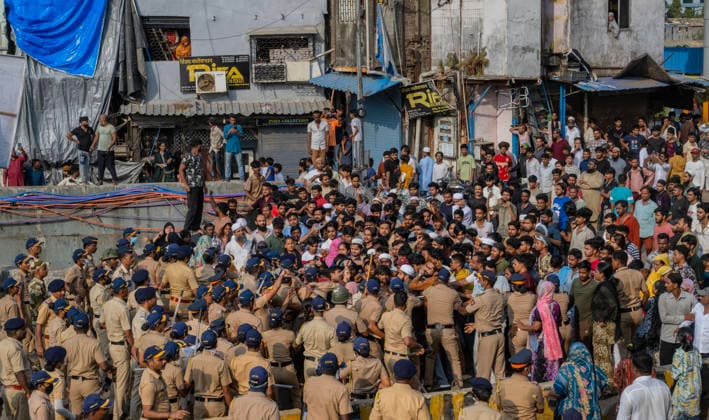 MUMBAI, INDIA - MAY 20: Heavy police deployment on the second day of an anti-encroachment drive at Garib Nagar slum on railway land on May 20, 2026 in Mumbai, India. (Photo by Satish Bate Hindustan Times) Second Day Of Demolition Drive At Bandra Garib Nagar