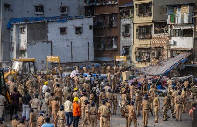 MUMBAI, INDIA - MAY 20: Heavy police deployment on the second day of an anti-encroachment drive at Garib Nagar slum on railway land on May 20, 2026 in Mumbai, India. (Photo by Satish Bate Hindustan Times) Second Day Of Demolition Drive At Bandra Garib Nagar