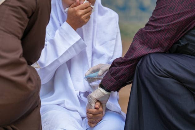 May 21, 2026, Banda Aceh, Aceh, Indonesia: Medical personnel check on the condition of a lawbreaker sentenced to 100 lashes in Banda Aceh, Aceh Province, Indonesia, on Thursday. The caning was imposed after being found guilty of violating Aceh s Sharia law. The public caning serves as a lesson and transparency in the implementation of punishment, guaranteed by the Aceh Qanun (Aceh Law), which was passed in 2014. Banda Aceh Indonesia - ZUMAi115 20260521_zip_i115_027 Copyright: xMuhammadxIqbalx