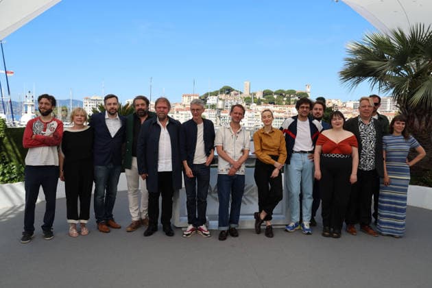 May 21, 2026, Cannes, France: Guit Harpo, Claudine Barthel-Fournier, Florian Surrier, Raphael Thiery, Swann Arlaud, Emmanuel Marre, Sandrine Blancke, Jean-Baptiste Marre, Mathilde Abd El Kader and Frank Williams pose at the photocall of Notre Salut (A Man of his Time) during the 79th Cannes Film Festival at Palais des Festivals in Cannes, France, on 20 May 2026. Photo: Cannes France - ZUMAm179 20260521_zep_m179_029 Copyright: xAlecxMichaelx