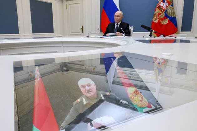 RUSSIA, MOSCOW - MAY 21, 2026: Russia s President Vladimir Putin (background) and Belarus President Alexander Lukashenko (on screen) take part in a nuclear exercise held by the Russian and Belarusian Armed Forces, via a video link Moscow Russia  - ZUMAt113 20260521_zaa_t113_135 Copyright: xMikhailxMetzelx