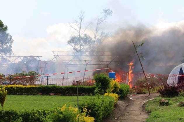 (260521) -- BUNIA, May 21, 2026 -- An Ebola isolation site is set on fire in Rwampara town, near Bunia of Ituri Province, the Democratic Republic of the Congo, on May 21, 2026. The outbreak, initially reported in Ituri Province, has now affected North Kivu and South Kivu, while two confirmed cases have also been reported in the neighboring country of Uganda. ( Xinhua) DR CONGO-ITURI-EBOLA OUTBREAK str 