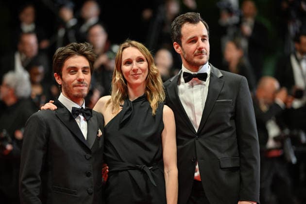 Cannes Screening Coward JR Martin Darondeau, Pauline Clement, Bertrand Usclat attending the screening of the movie Coward during the 79th Cannes Film Festival in Cannes, France on May 21, 2026. Photo by Julien Reynaud APS-Medias ABACAPRESS.COM Cannes France  Copyright: xReynaudxJulien APS-Medias ABACAx