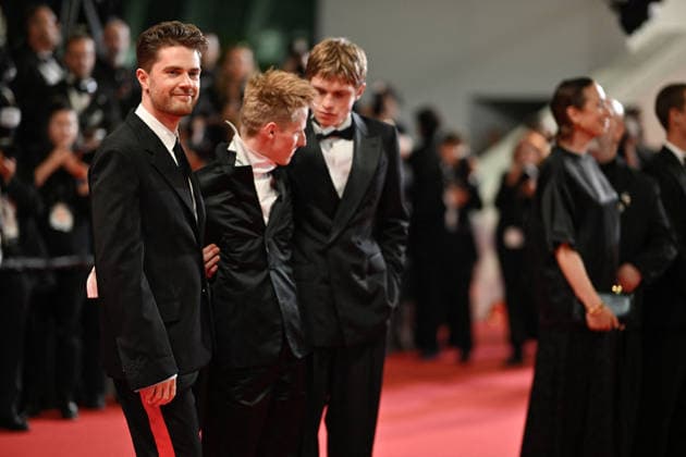 Cannes Screening Coward JR Emmanuel Macchia, Lukas Dhont, Valentin Campagne attending the screening of the movie Coward during the 79th Cannes Film Festival in Cannes, France on May 21, 2026. Photo by Julien Reynaud APS-Medias ABACAPRESS.COM Cannes France  Copyright: xReynaudxJulien APS-Medias ABACAx