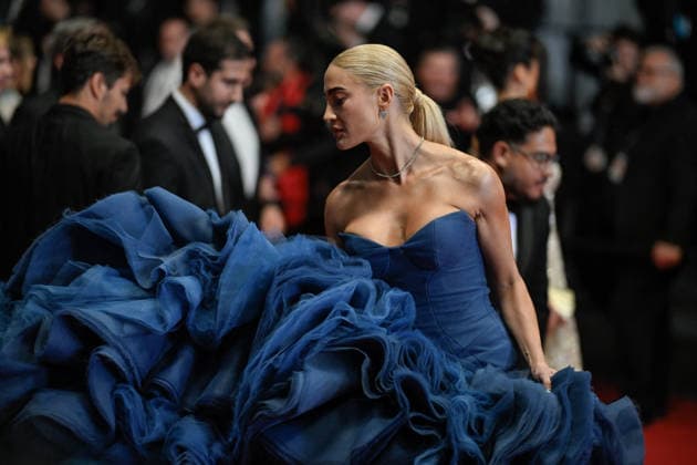 Cannes Screening Coward JR A guest attending the screening of the movie Coward during the 79th Cannes Film Festival in Cannes, France on May 21, 2026. Photo by Julien Reynaud APS-Medias ABACAPRESS.COM Cannes France  Copyright: xReynaudxJulien APS-Medias ABACAx