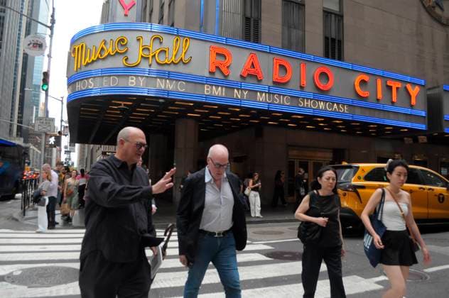 Daily Life in New York City, US - 20 May 2026 People walk past Radio City Music Hall in Manhattan, New York City. New York United States Copyright: xJiminxKimx xSOPAxImagesx JKIM_daily_life_nyc_may_20_26_DSC5759.jpeg
