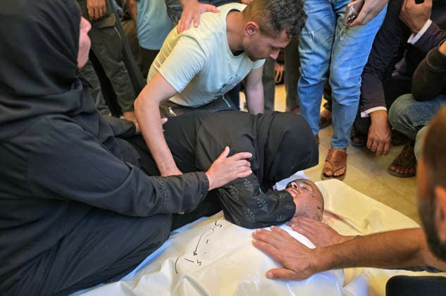 Palestinians Mourn Shepherd Killed Near Khan Younis Palestinians mourn the body of Raafat Breika, 42, who was killed by Israeli army fire while herding sheep near the Yellow Line south of Khan Younis in the southern Gaza Strip, on May 22, 2026. Photo by Tariq Mohammad APA Images Khan Yunis Gaza Strip Palestinian Territory 220526_Khan_Yunis_TM_00(8) Copyright: xapaimagesxTariqxMohammad xapaimagesx