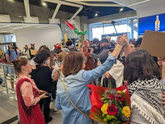 Protesters welcome returned Global Sumud Flotilla activists at Paris airport PARIS, FRANCE - MAY 22: Protesters welcome the Global Sumud Flotilla’s repatriated activists at the Roissy Charles de Gaulle Airport in Paris, France on May 22, 2026. Luc Auffret Anadolu Paris France. Editorial use only. Please get in touch for any other usage.  Copyright: x2026xAnadoluxLucxAuffretx