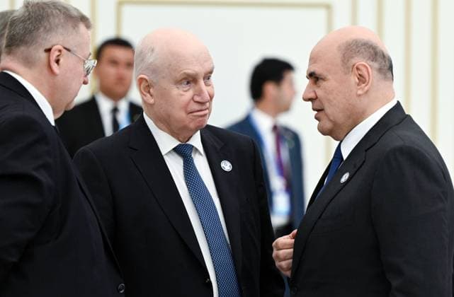 Turkmenistan CIS Government Heads Council 9171513 22.05.2026 Russian Prime Minister Mikhail Mishustin talks to CIS Secretary General Sergei Lebedev, centre, and Deputy Prime Minister Alexei Overchuk, left, after an expanded format meeting of the Commonwealth of Independent States (CIS) Heads of Government Council in Ashgabat, Turkmenistan. Alexander Miridonov Sputnik Ashgabat Turkmenistan  Copyright: xAlexanderxMiridonovx