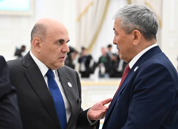 Turkmenistan CIS Government Heads Council 9171528 22.05.2026 Russian Prime Minister Mikhail Mishustin and Kyrgyz Prime Minister Adylbek Kasymaliev, right, talk after an expanded format meeting of the Commonwealth of Independent States (CIS) Heads of Government Council in Ashgabat, Turkmenistan. Alexander Miridonov Sputnik Ashgabat Turkmenistan  Copyright: xAlexanderxMiridonovx