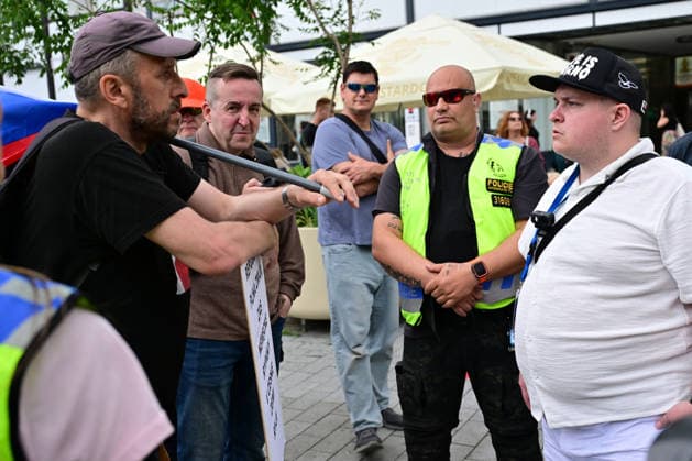 Manifestation rally on Liberty Square to express opposition to the holding of the Congress of Sudeten Germans in Brno, 22 May 2026, Czech Republic. On the right is activist Vojtech Psenak, discussing with one of the participants. (CTKxPhoto VaclavxSalek) CTKPhotoP2026052205863  CTKPhotoP2026052205863