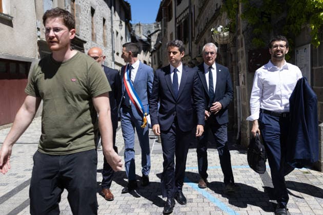 Gabriel Attal Announces his candidacy for the presidential elections - Mur-de-Barrez General Secretary of French centrist party Renaissance Gabriel Attal, Mayor of Mur-de-Barrez Pierre Ignace arrives to delivers a speech during a visit to the village of Mur-de-Barrez in the Aveyron department, southwestern France on May 22, 2026. Former prime minister Gabriel Attal said on May 22, 2026 he was running for president next year. Photo by Raphael Lafargue ABACAPRESS.COM Mur-de-Barrez France  Copyright: xLafarguexRaphael ABACAx