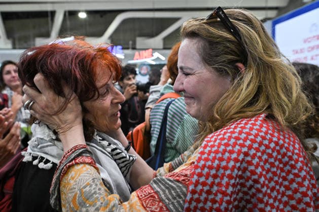 Protesters welcome Global Sumud Flotilla activists in Paris PARIS, FRANCE - MAY 22: Protesters welcome the Global Sumud Flotilla’s repatriated activists at the Charles de Gaulle Airport in Paris, France on May 22, 2026. Firas Abdullah Anadolu Paris France. Editorial use only. Please get in touch for any other usage.  Copyright: x2026xAnadoluxFirasxAbdullahx