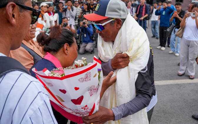 Record holder mountaineer, Kami Rita Sherpa arrived at Tribhuvan International Airport in Kathmandu in Nepal - 22 MAY 2026. Friends and Family members of the mountaineer and guide, Kami Rita Sherpa seen welcoming him at Tribhuvan International Airport after setting a new record by successfully scaling Mount Everest for the 32nd time. Kathmandu Nepal Copyright: xSunilxPradhanx xSOPAxImagesx DSC02333