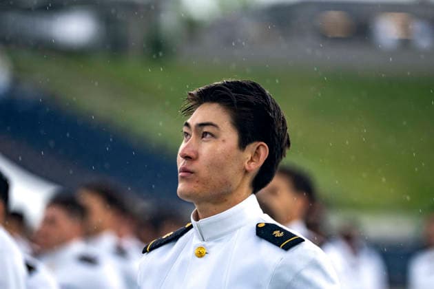 Midshipmen wait to take the oath of office during the U.S. Naval Academy Graduation and Commissioning Ceremony at the U.S. Naval Academy in Annapolis, Maryland on Friday, May 22, 2026. The Naval Academy has a total of 1059 graduates.  ANN20260522328 BONNIExCASH