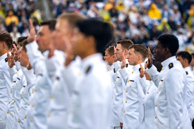 Midshipmen take the oath of office during the U.S. Naval Academy Graduation and Commissioning Ceremony at the U.S. Naval Academy in Annapolis, Maryland on Friday, May 22, 2026. The Naval Academy has a total of 1059 graduates.  ANN20260522331 BONNIExCASH