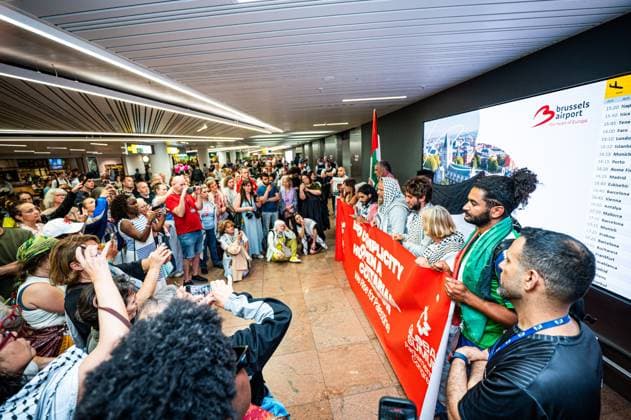 People welcome Belgian activists who were part of the Gaza Flotilla arrive at Brussels Airport, in Zaventem, Friday 22 May 2026.  EMILExWINDAL 174747131