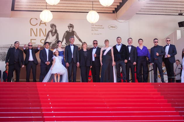 May 22, 2026, Cannes, France: Syuleyman Alilov Letifov (5thL) Valeska Grisebach (7thL) and guests attend the red carpet of Das Geträumte Abenteuer at the 79th Cannes Film Festival. Cannes France - ZUMAs197 20260522_aaa_s197_026 Copyright: xMarcoxBaradax