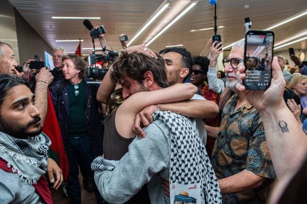 Belgian activist Isja pictured as Belgian activists who were part of the Gaza Flotilla arrive at Brussels Airport, in Zaventem, Friday 22 May 2026.  EMILExWINDAL 174748557
