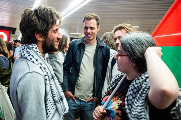 PTB-PVDA s Jos D haese (C) pictured as Belgian activists who were part of the Gaza Flotilla arrive at Brussels Airport, in Zaventem, Friday 22 May 2026.  EMILExWINDAL 174749330