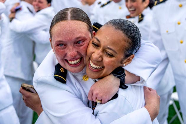 Naval Academy graduates celebrate after throwing their caps to conclude the U.S. Naval Academy Graduation and Commissioning Ceremony at the U.S. Naval Academy in Annapolis, Maryland on Friday, May 22, 2026. The Naval Academy has a total of 1059 graduates.  ANN20260522345 BONNIExCASH