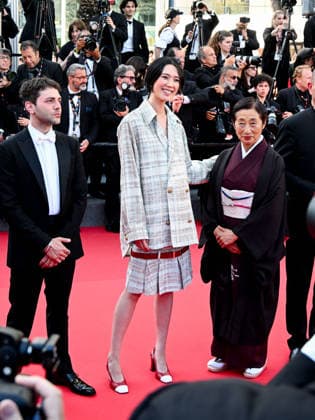 IPA84975294 - Cannes, 79th Cannes Film Festival 2026 - evening 11. Red Carpet HISTOIRES DE LA NUIT (THE BIRTHDAY PARTY) Pictured: guest, Tao Okamoto, Xavier Dolan  Copyright: xManuelexMangiarottix xPoolxPhotoxEventsx07x 84975294