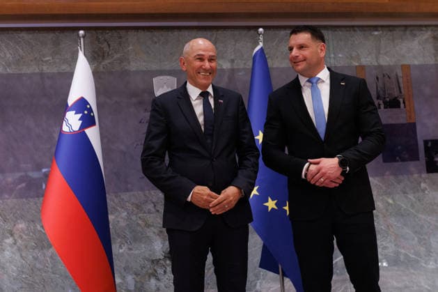 (260522) -- LJUBLJANA, May 22, 2026 -- Janez Jansa (L) poses for photos with the president of the National Assembly, Zoran Stevanovic after an extraordinary session of the Slovenian National Assembly in Ljubljana, Slovenia, May 22, 2026. Slovenia s National Assembly on Friday appointed Janez Jansa as the country s prime minister-designate with 51 votes in favour and 36 against, according to the Slovenian News Agency. (Photo by Xinhua) SLOVENIA-LJUBLJANA-PRIME MINISTER-JANEZ JANSA ZeljkoxStevanic 