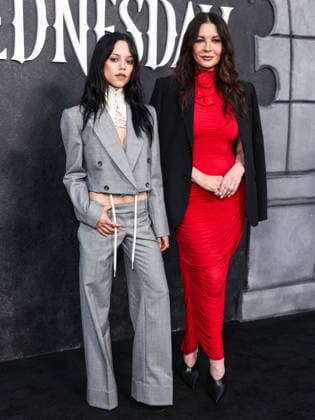 Netflix FYSEE LA - Wednesday Season 2 ATAS Emmy FYC Event HOLLYWOOD, LOS ANGELES, CALIFORNIA, USA - MAY 22: American actress Jenna Ortega wearing McQueen Pre Fall 2026, styled by Enrique Melendez and Welsh actress Catherine Zeta-Jones wearing Magda Butrym arrive at the Netflix FYSEE LA - Wednesday Season 2 ATAS (Academy of Television Arts and Sciences) Emmy FYC (For Your Consideration) Event held at the Hollywood Forever Cemetery on May 22, 2026 in Hollywood, Los Angeles, California, United States. Hollywood Hollywood Forever Cemetery California United States Copyright: xXavierxCollin ImagexPressxAgencyx