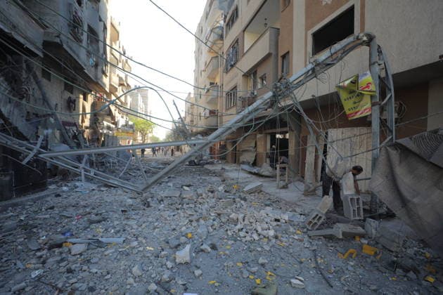 Palestinians inspect damage following Israeli strike in Nuseirat camp Palestinians inspect damage to homes and streets following an Israeli strike on a house and shops in the Nuseirat refugee camp in the central Gaza Strip on May 23, 2026. According to residents, the strike came after the collapse of a ceasefire agreement between Hamas and Israel. Hassan Jedi apaimages Nusairat Gaza Strip Palestinian Territory 230526_Nusairat_HJ_00(17).jpeg Copyright: xapaimagesxHassanxJedix xapaimagesx