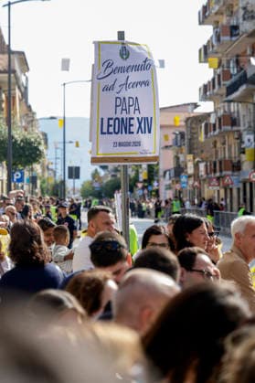 Visit of Pope Leo XIV to Acerra Along the streets of Acerra, near Naples, crowds of worshippers gathered to greet Pope Leo XIV as he passed through the town in the popemobile. Thousands of faithful lined the streets waving flags, applauding, and praying during the Pope™s pastoral visit, transforming the town into a moment of collective celebration and devotion.A deeply symbolic event marked by strong public participation and religious fervour. Acerra May 23, 2026. _BPH9893 Copyright: xAntonioxBalascox