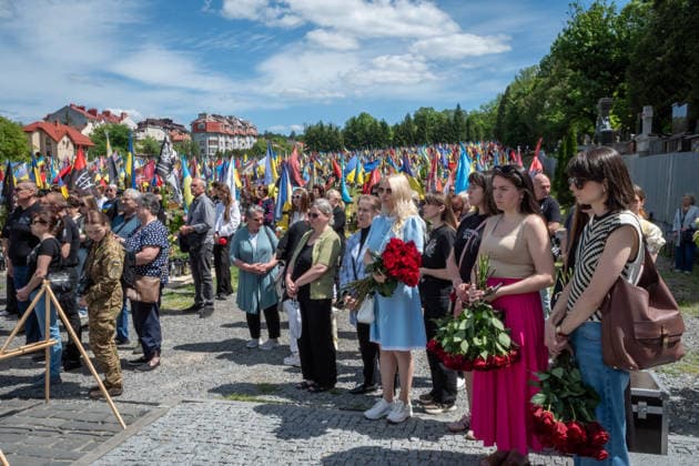 Commemoration procession held on Heroes Day in Lviv, Ukraine LVIV, UKRAINE, MAY 23: Military and civilians take part in a ceremony to honor the memory of fallen servicemen at the honorary burial grounds at the Lychakiv Cemetery during the Day of Heroes of Ukraine in Lviv, Ukraine, May 23, 2026. Also on this day, military personnel, police, members of youth organizations and civilians marched through the city in a solemn procession dedicated to all participants of the ATO JFO, war veterans and participants who died or are fighting for the freedom of Ukraine. Olena Znak Anadolu Lviv Ukraine. Editorial use only. Please get in touch for any other usage.  Copyright: x2026xAnadoluxOlenaxZnakx