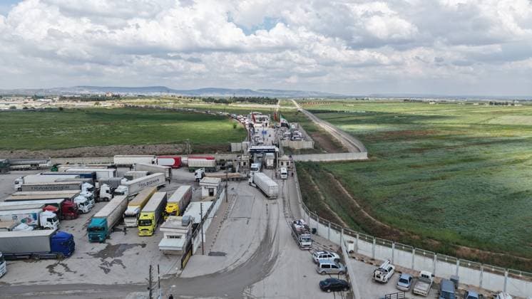 Syrian citizens create heavy congestion at border gates ahead of Eid al-Adha ALEPPO, SYRIA - MAY 23: Syrian citizens, who have been living in Turkiye for many years, cause heavy congestion at the border gates as they head back to their home country to spend the upcoming Eid al-Adha, in Bab al-Salam border crossing of Azaz, Aleppo, Syria on May 23, 2026. It is reported that approximately 2,000 people cross into Syria daily through Oncupinar, while similar crowds and intensive activity are observed at the Bab al-Salameh (Elsalame) Border Gate on the Syrian side. Bakr Al Kasem Anadolu Aleppo Syria. Editorial use only. Please get in touch for any other usage.  Copyright: x2026xAnadoluxBakrxAlxKasemx