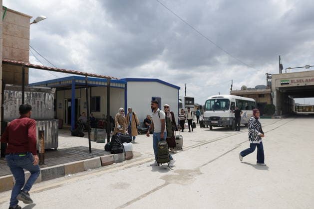 Syrian citizens create heavy congestion at border gates ahead of Eid al-Adha ALEPPO, SYRIA - MAY 23: Syrian citizens, who have been living in Turkiye for many years, cause heavy congestion at the border gates as they head back to their home country to spend the upcoming Eid al-Adha, in Bab al-Salam border crossing of Azaz, Aleppo, Syria on May 23, 2026. It is reported that approximately 2,000 people cross into Syria daily through Oncupinar, while similar crowds and intensive activity are observed at the Bab al-Salameh (Elsalame) Border Gate on the Syrian side. Bakr Al Kasem Anadolu Aleppo Syria. Editorial use only. Please get in touch for any other usage.  Copyright: x2026xAnadoluxBakrxAlxKasemx