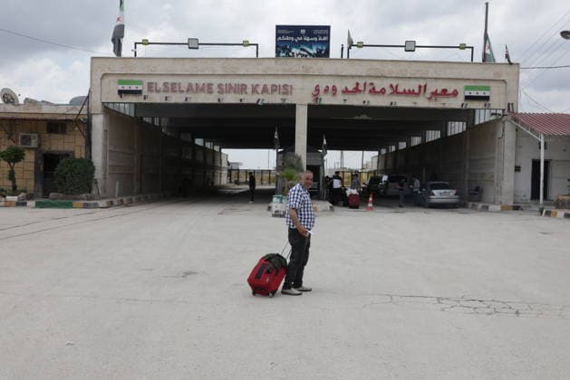 Syrian citizens create heavy congestion at border gates ahead of Eid al-Adha ALEPPO, SYRIA - MAY 23: Syrian citizens, who have been living in Turkiye for many years, cause heavy congestion at the border gates as they head back to their home country to spend the upcoming Eid al-Adha, in Bab al-Salam border crossing of Azaz, Aleppo, Syria on May 23, 2026. It is reported that approximately 2,000 people cross into Syria daily through Oncupinar, while similar crowds and intensive activity are observed at the Bab al-Salameh (Elsalame) Border Gate on the Syrian side. Bakr Al Kasem Anadolu Aleppo Syria. Editorial use only. Please get in touch for any other usage.  Copyright: x2026xAnadoluxBakrxAlxKasemx